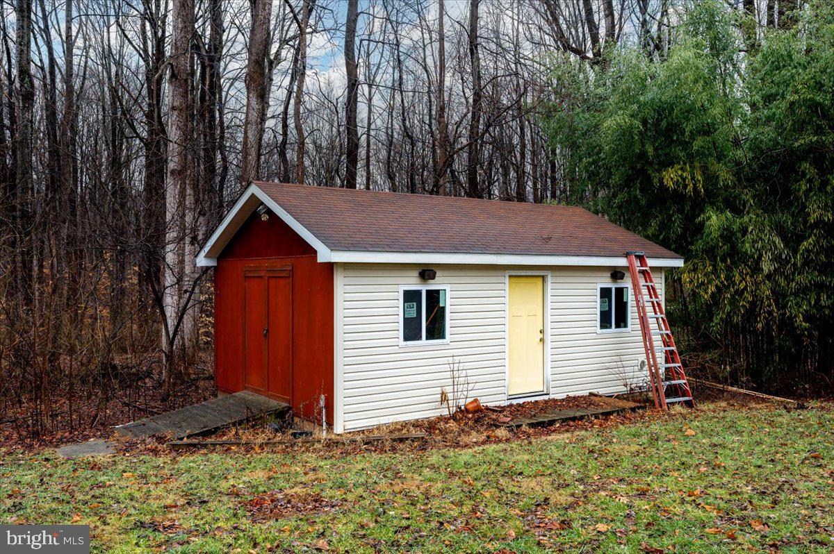 6343 Meadowland Drive Dunkirk, MD 20754 - Photo 31 of 31 a view of a house with backyard and trees