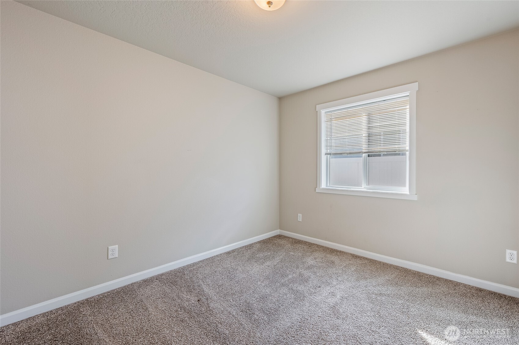 730 L Street Northeast Quincy, WA 98848 - Photo 15 of 29 an empty room with a window
