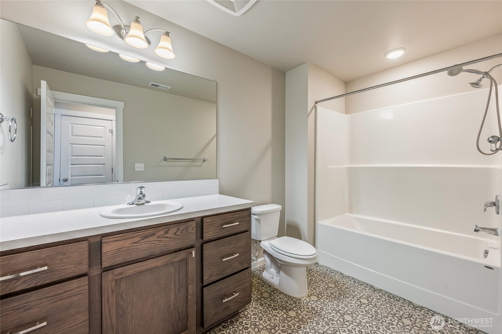 730 L Street Northeast Quincy, WA 98848 - Photo 22 of 29 a bathroom with a sink a toilet and shower