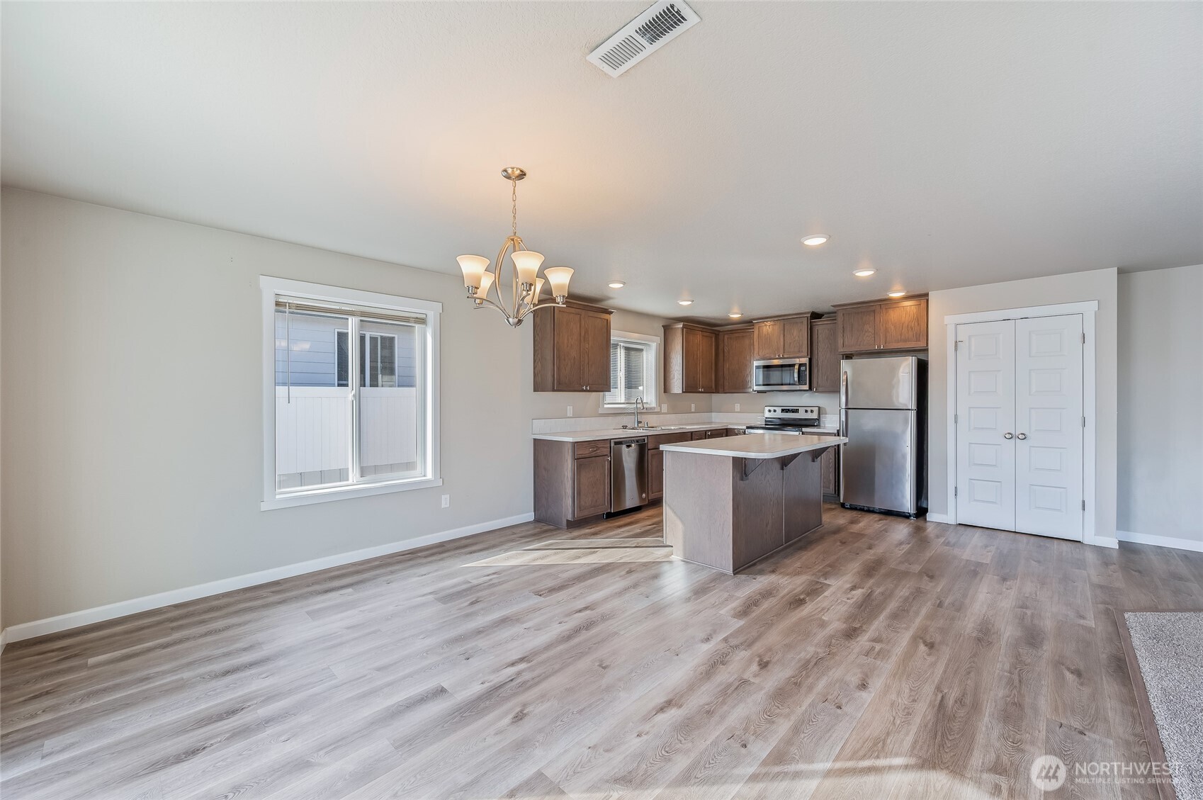 730 L Street Northeast Quincy, WA 98848 - Photo 5 of 29 a large kitchen with a lot of counter space and wooden floor