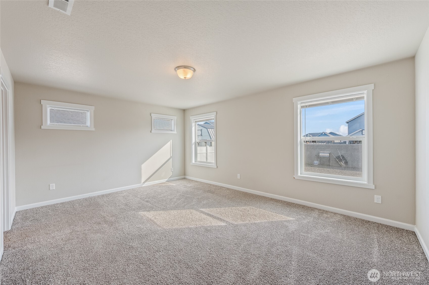 730 L Street Northeast Quincy, WA 98848 - Photo 9 of 29 a view of an empty room with a window