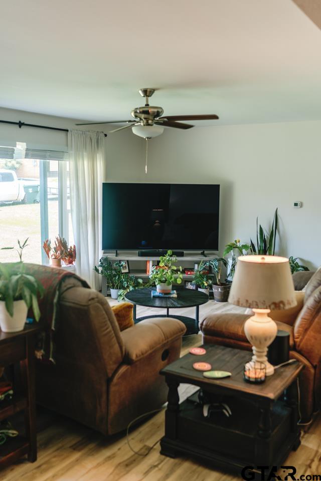 2411 Rodge Drive Tyler, TX 75701 - Photo 3 of 42 a living room with furniture and a flat screen tv