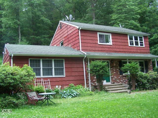 8 Warwick Road New Fairfield, CT 06812 - Photo 1 of 1 a view of a house with a backyard
