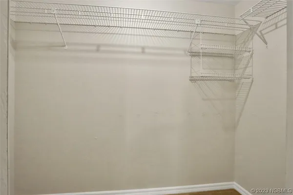 a view of a house with a yard porch and sitting area