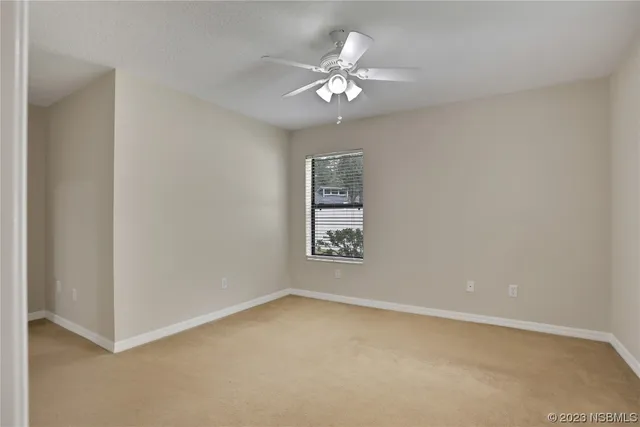 an aerial view of a houses with outdoor space