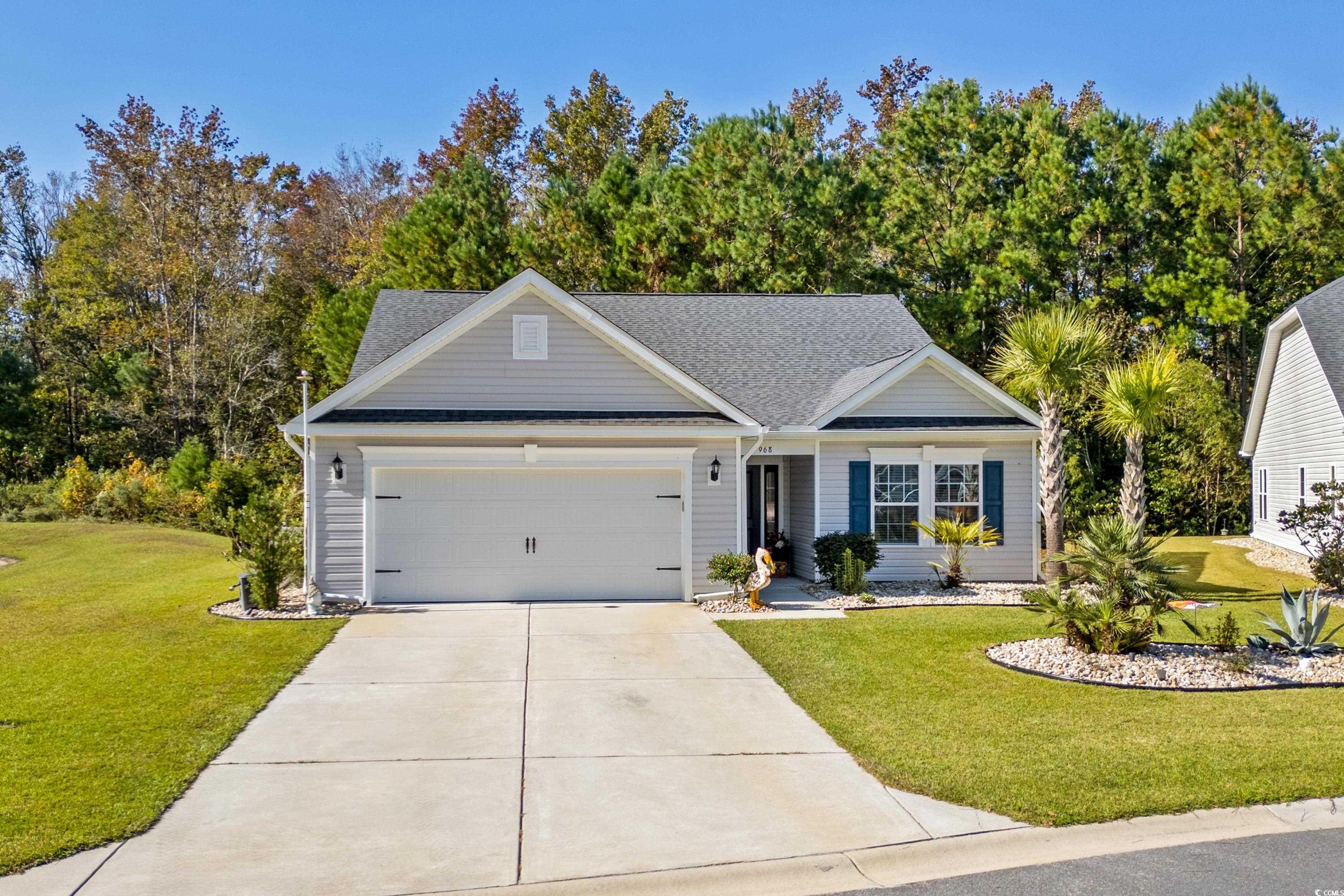 968 Cypress Way Little River, SC 29566 - Photo 2 of 40 View of front of house with a front lawn and a gar
