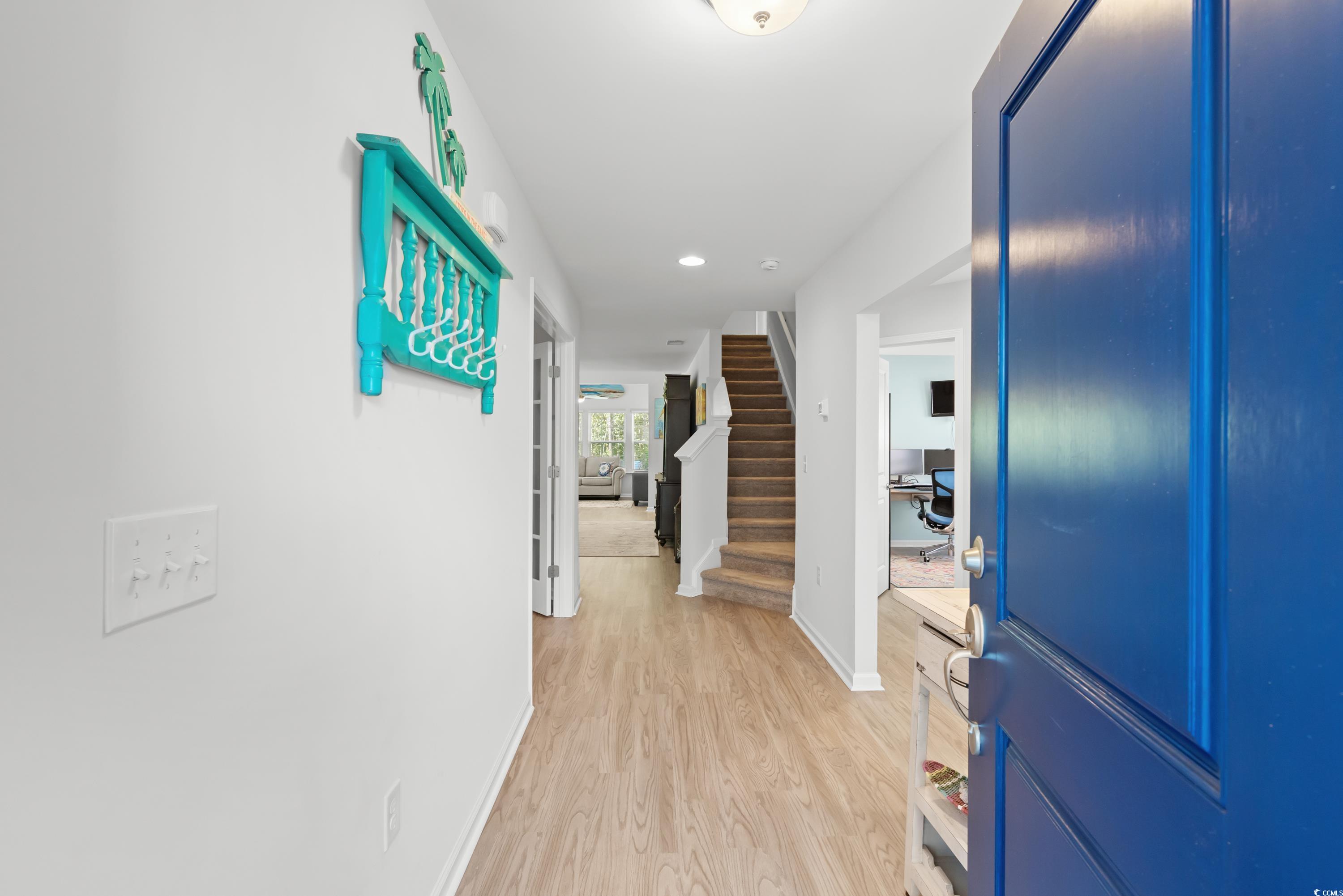 968 Cypress Way Little River, SC 29566 - Photo 3 of 40 Entryway with light hardwood / wood-style flooring
