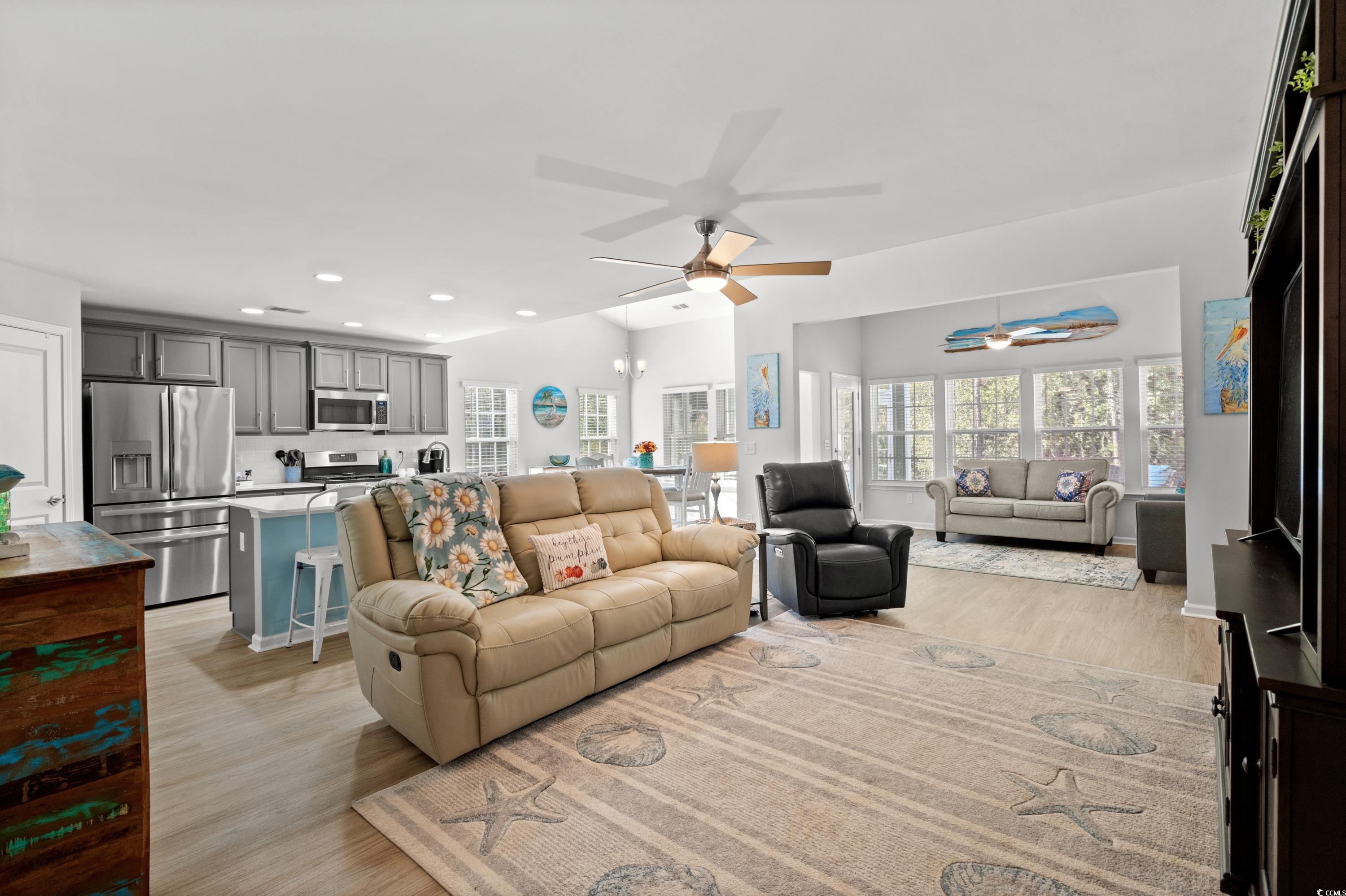 968 Cypress Way Little River, SC 29566 - Photo 5 of 40 Living room featuring light hardwood / wood-style