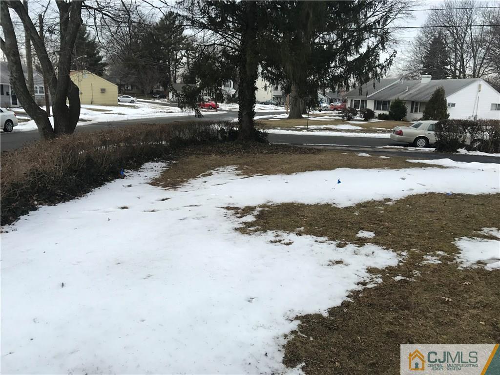 47 Kenmore Road Edison, NJ 08817 - Photo 2 of 14 a view of road with covered with snow