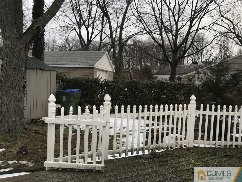 47 Kenmore Road Edison, NJ 08817 - Photo 14 of 14 a view of a house with a small yard