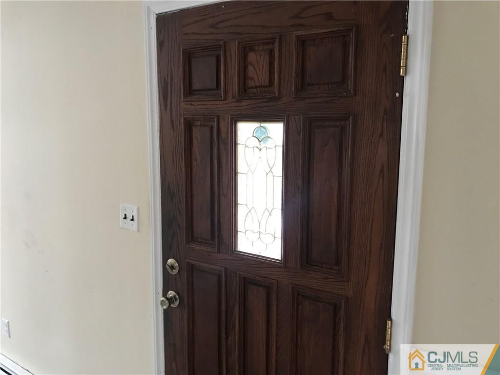 47 Kenmore Road Edison, NJ 08817 - Photo 5 of 14 a view of a windows and a hallway
