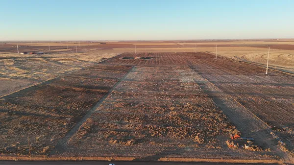 an aerial view of beach and ocean