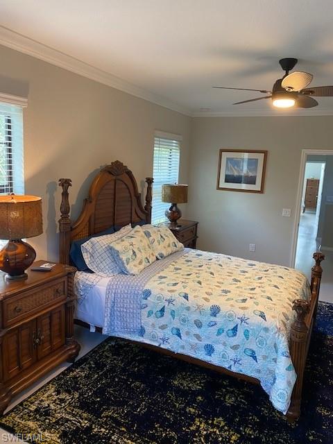 1330 Oceania Drive, Unit 2 Naples, FL 34113 - Photo 13 of 30 a bedroom with a bed and dresser