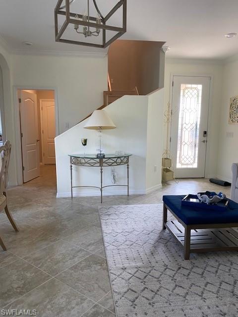 1330 Oceania Drive, Unit 2 Naples, FL 34113 - Photo 20 of 30 a living room with furniture and window