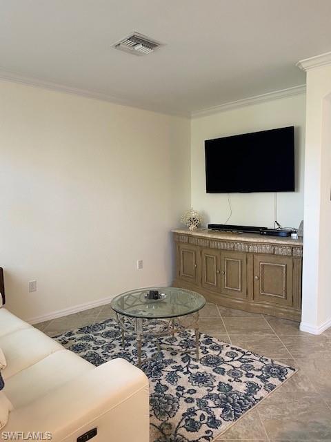 1330 Oceania Drive, Unit 2 Naples, FL 34113 - Photo 21 of 30 a living room with furniture and a flat screen tv