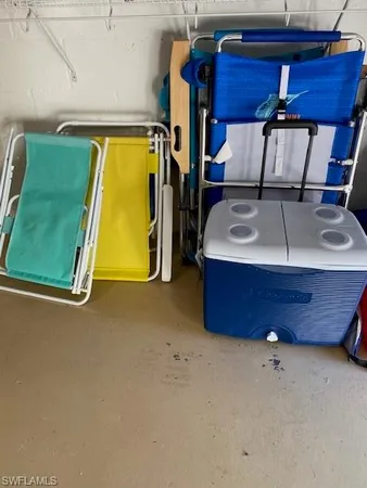 a bed sitting in a room next to a window