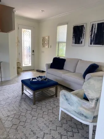a living room with furniture and a couch