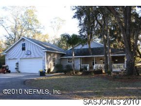 4640 Carter Road St. Augustine, FL 32086 - Photo 1 of 12 a view of outdoor space yard and garage