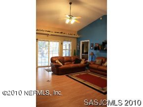 4640 Carter Road St. Augustine, FL 32086 - Photo 11 of 12 a living room with furniture and a large window