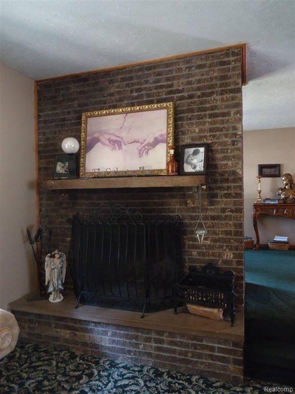 10550 West Sargent Road Fowlerville, MI 48836 - Photo 9 of 22 Fireplace in Living Room