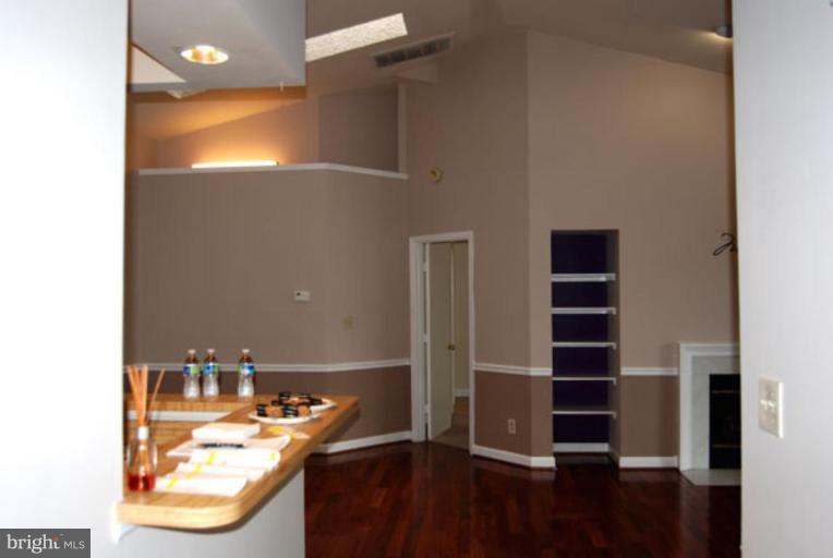 13708 Modrad Way, Unit 7B42 Silver Spring, MD 20904 - Photo 22 of 27 Living Room/Dining Room