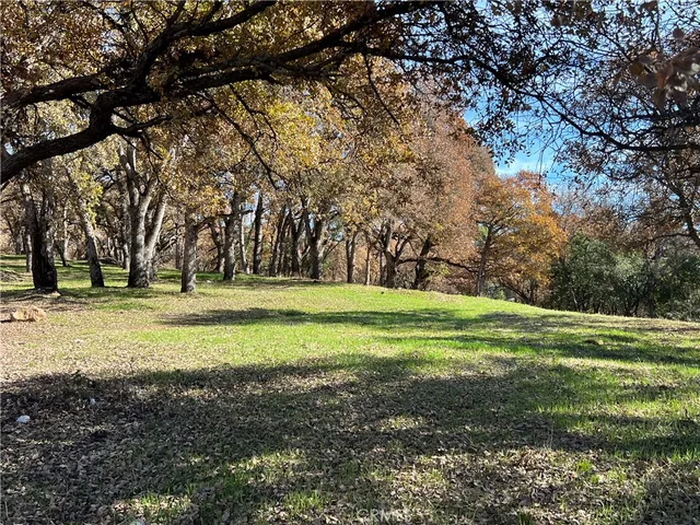 a view of a house with a big yard