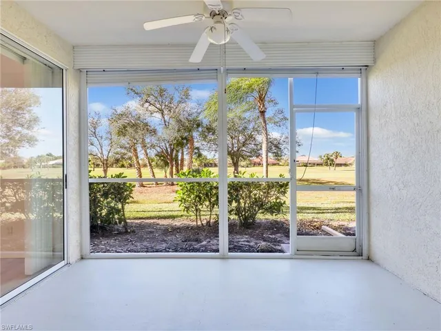 a view of a glass door and porch