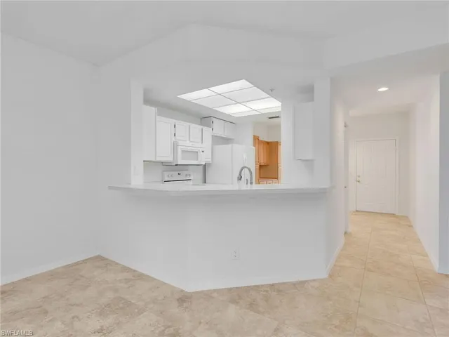 a room with furniture and a window