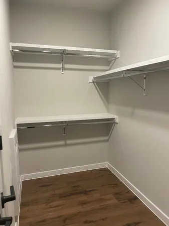a view of an empty walk in closet