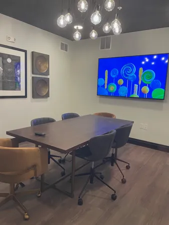 a view of a dining room with furniture