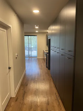 an empty room with wooden floor