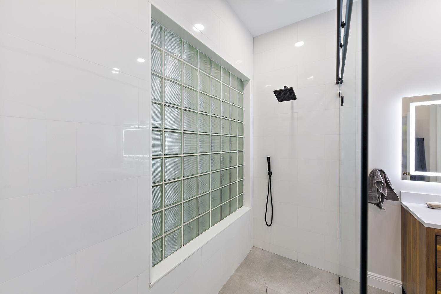 6685 Northwest 24th Terrace Boca Raton, FL 33496 - Photo 16 of 31 a bathroom with a shower