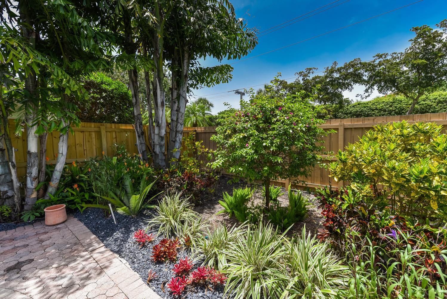 6685 Northwest 24th Terrace Boca Raton, FL 33496 - Photo 30 of 31 a view of a garden
