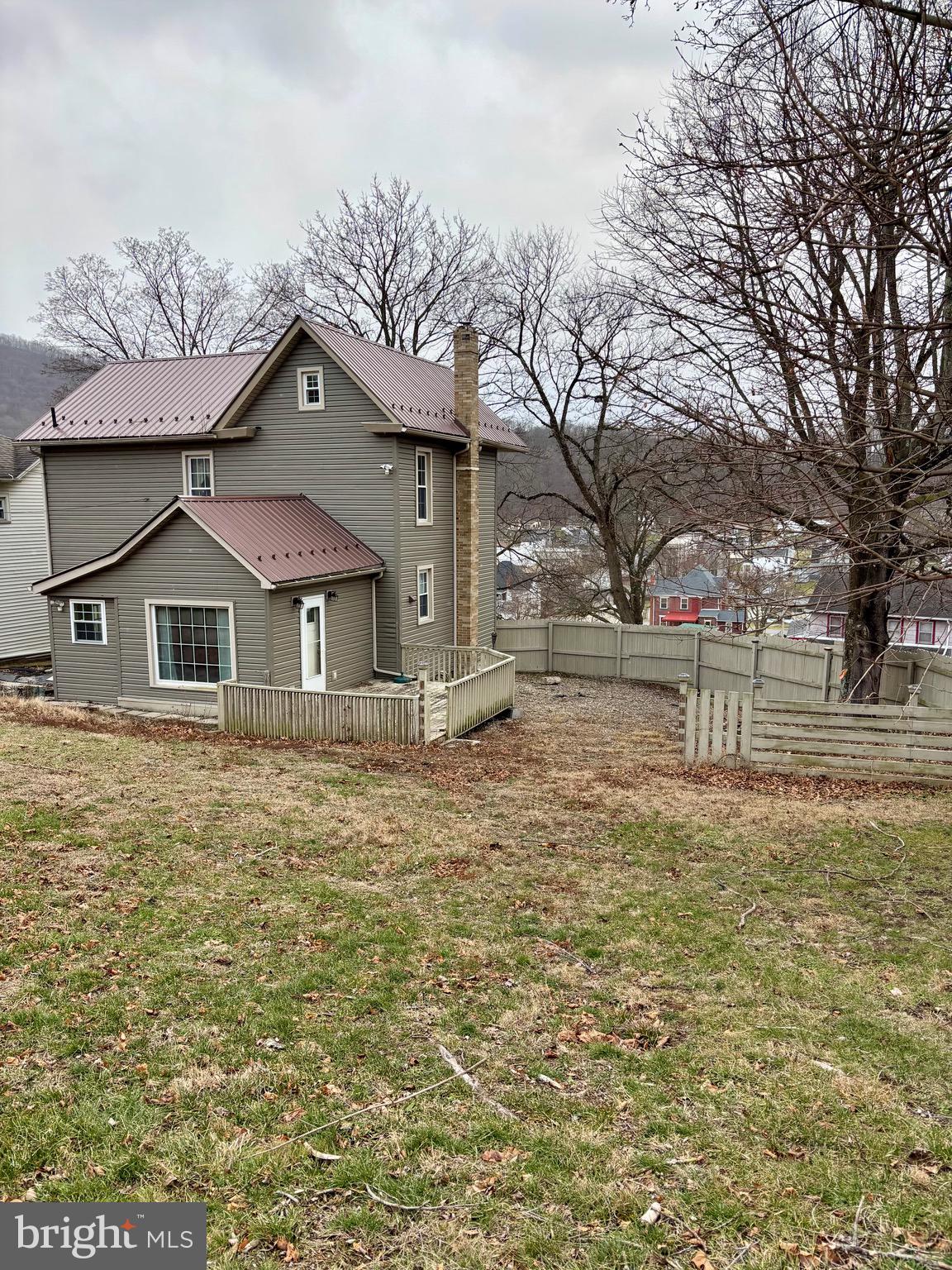1006 Main Street Saxton, PA 16678 - Photo 5 of 40 a front view of a house with a yard