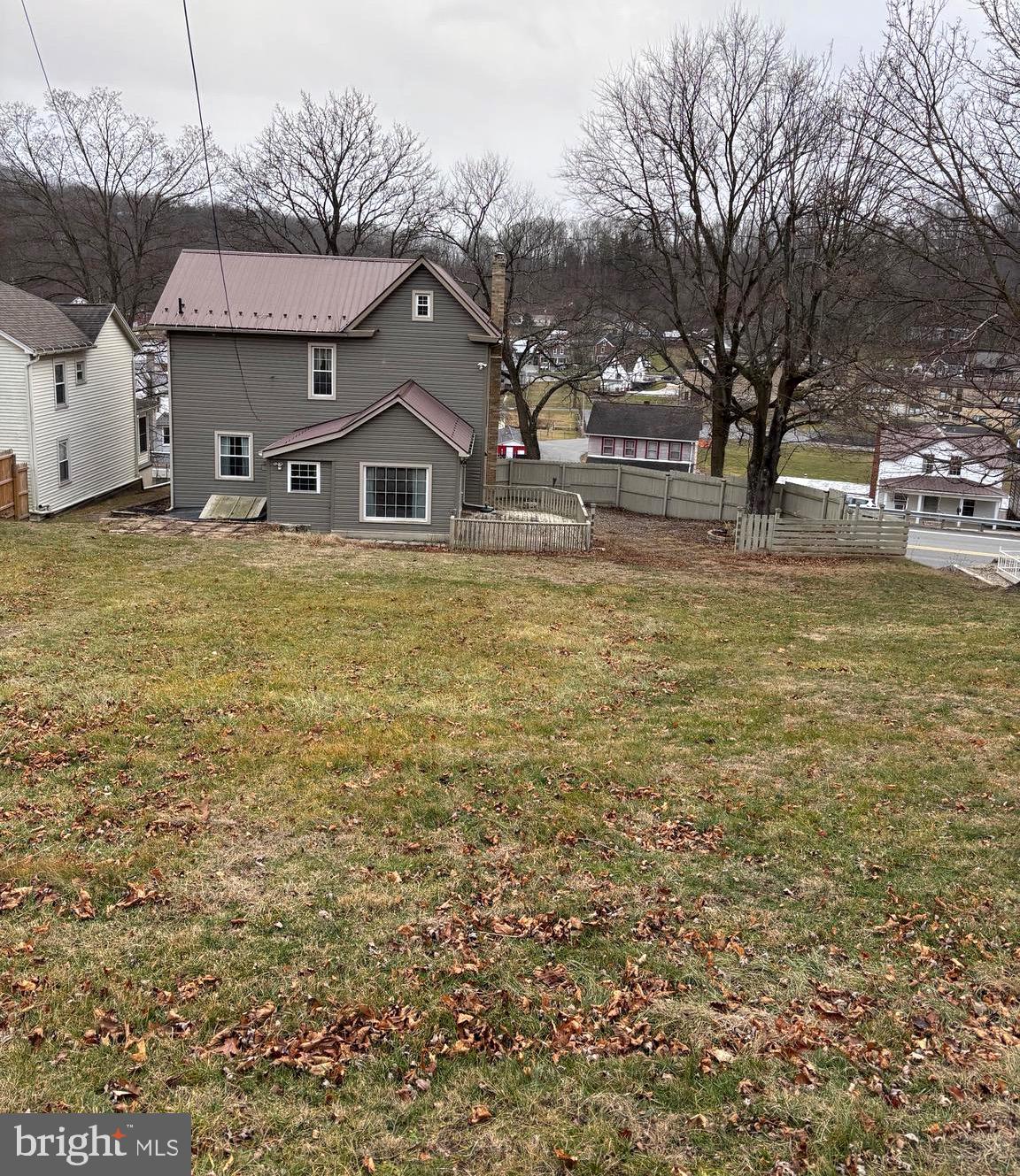 1006 Main Street Saxton, PA 16678 - Photo 6 of 40 a front view of a house with a yard