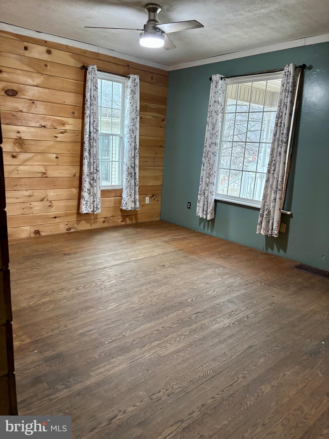 1006 Main Street Saxton, PA 16678 - Photo 10 of 40 an empty room with windows
