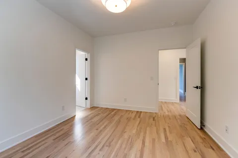 a bathroom with a sink toilet tub and shower