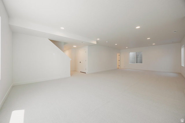 5902 Canyon Rim Road, Unit 620 Lehi, UT 84048 - Photo 62 of 78 Spacious carpeted room featuring white walls and recessed lighting