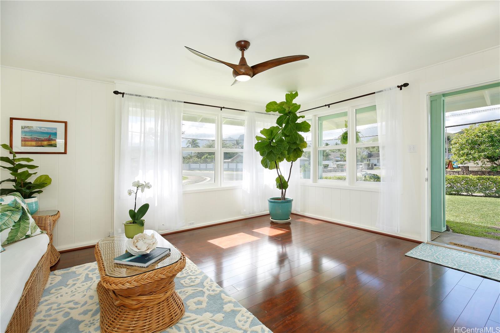 425 Ka Awakea Road Kailua, HI 96734 - Photo 1 of 1 a living room with furniture and a potted plant