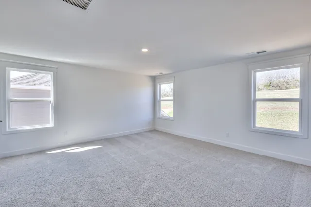 a view of an empty room and window