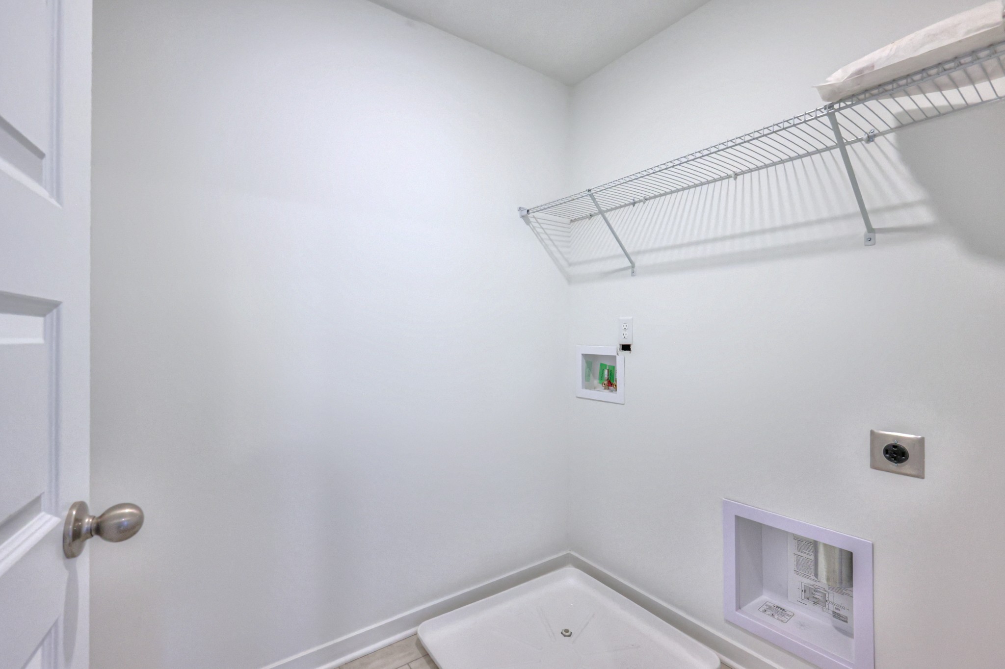 2584 Bluestem Road Columbia, TN 38401 - Photo 3 of 35 a view of a room with racks on the wall