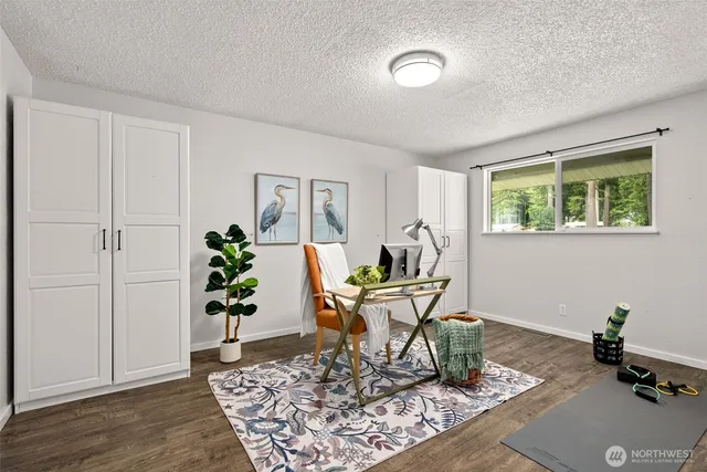 a bathroom with a toilet sink and shower