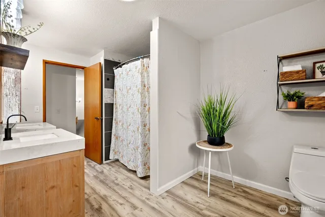 a bedroom with bed and window