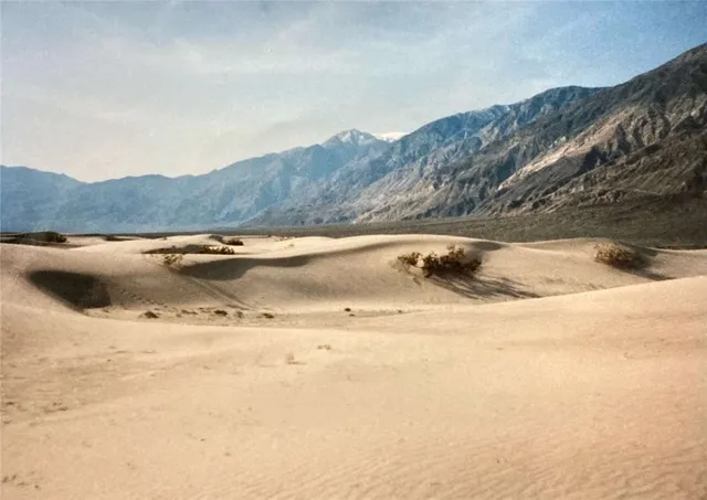 a view of mountain and mountains