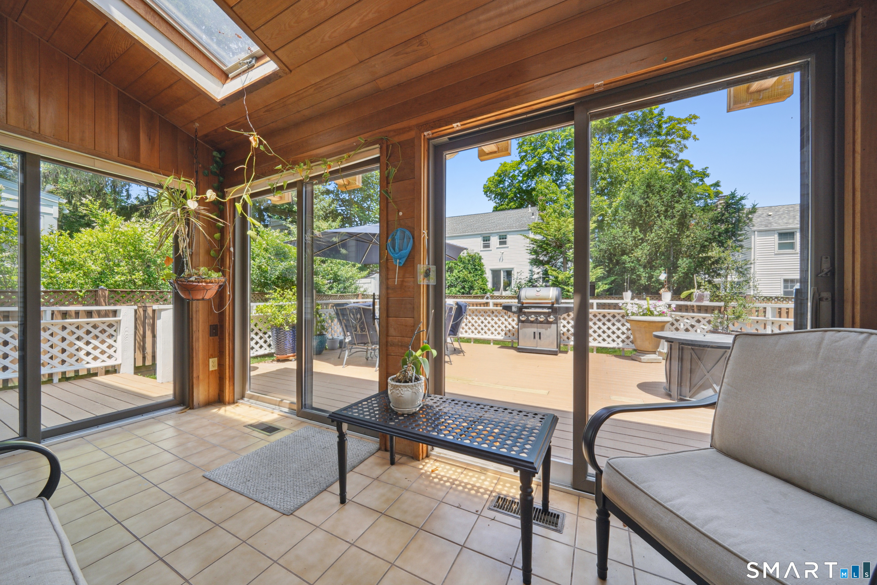 20 Norman Road Stamford, CT 06906 - Photo 14 of 35 a living room with furniture and a floor to ceiling window