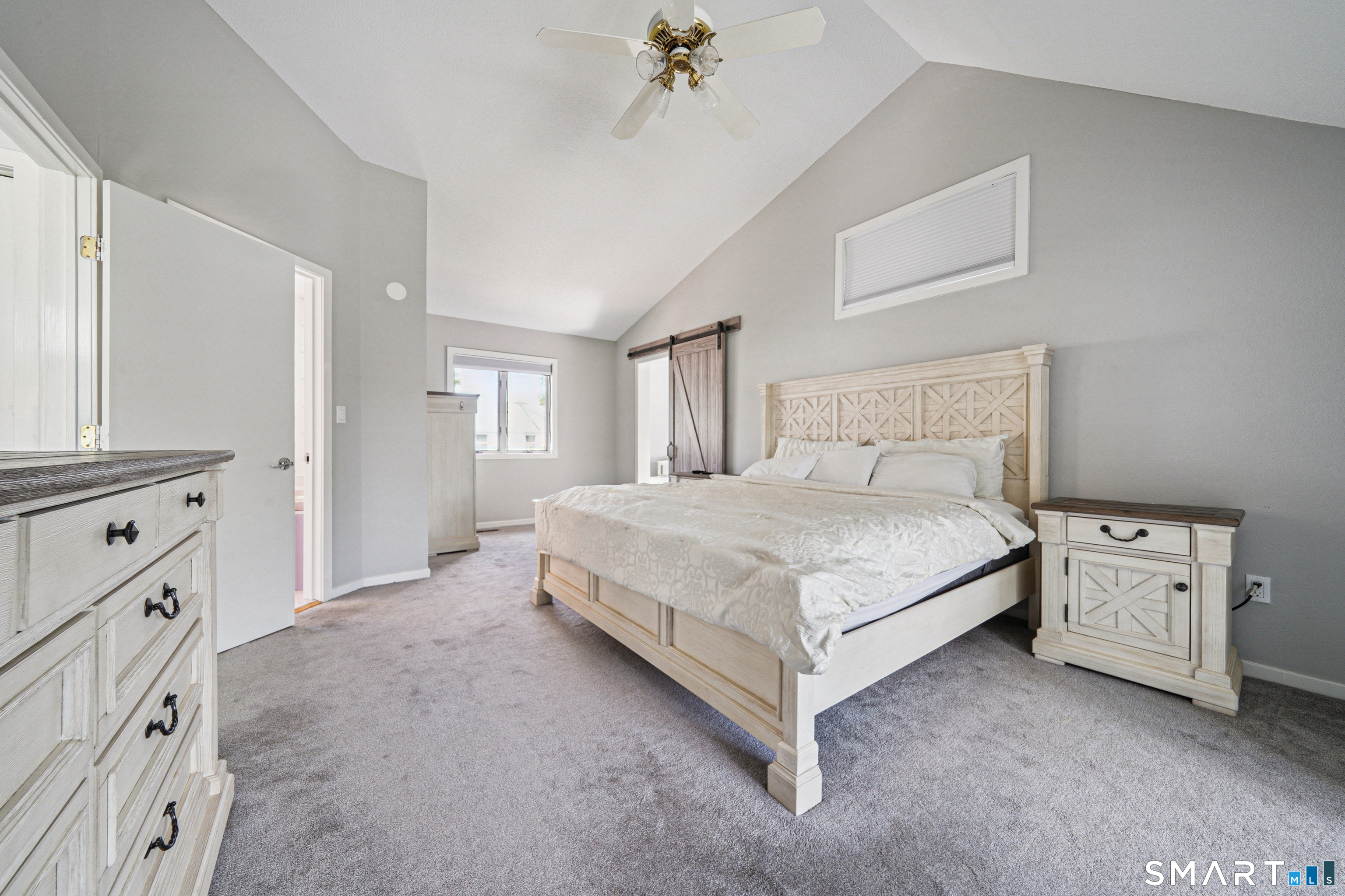 20 Norman Road Stamford, CT 06906 - Photo 15 of 35 a bedroom with a bed and a cabinets