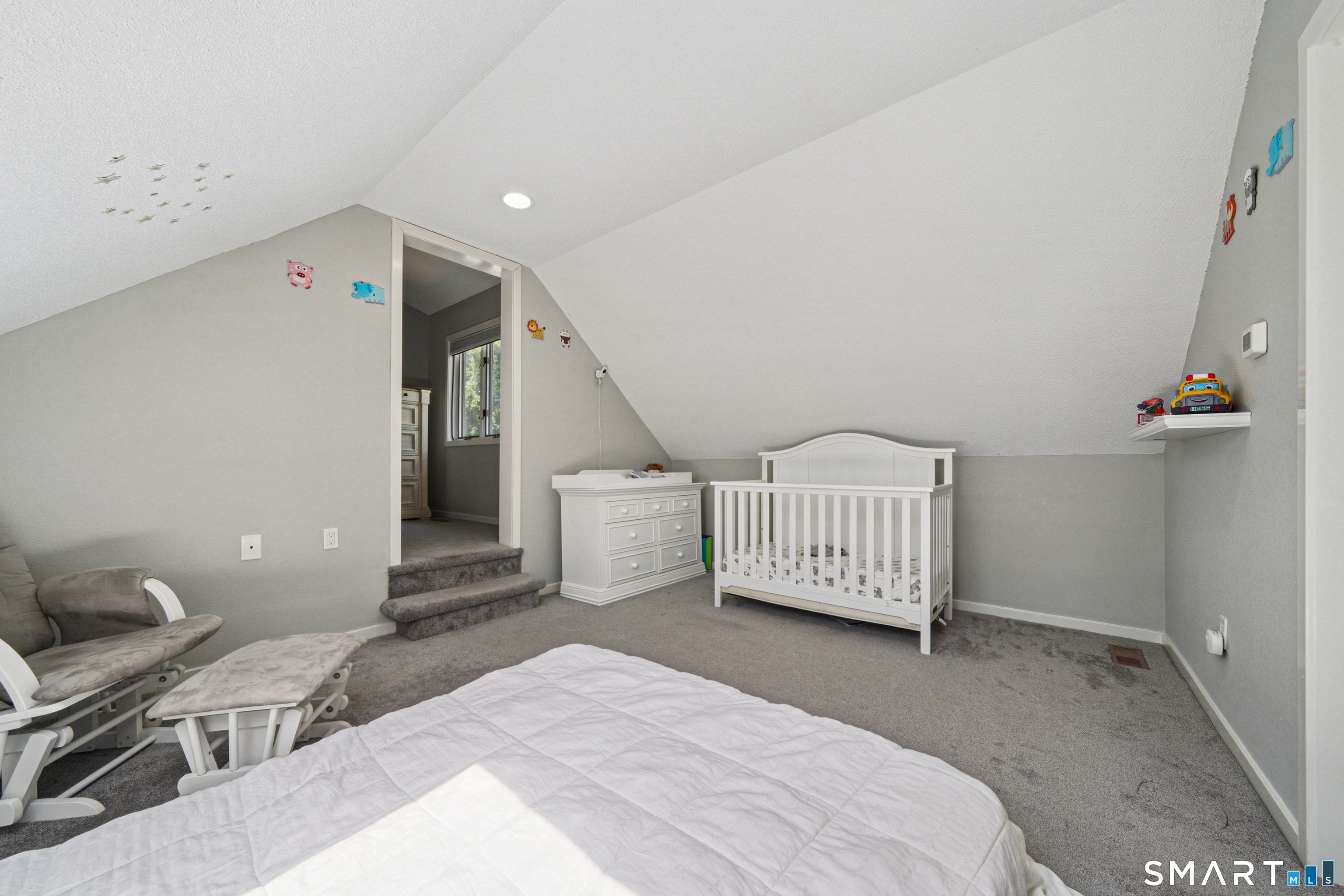 20 Norman Road Stamford, CT 06906 - Photo 18 of 35 a spacious bedroom with a bed and a window