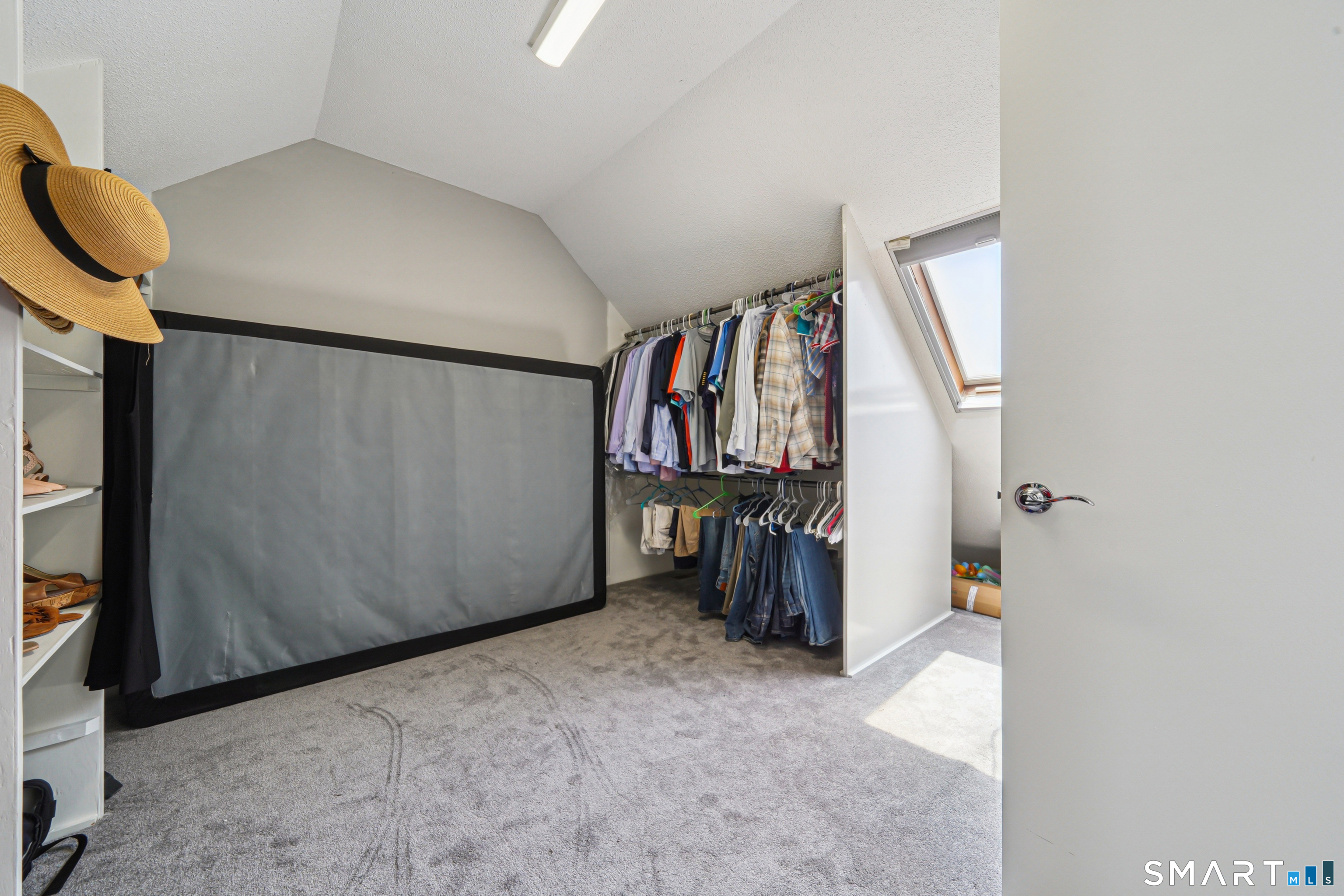 20 Norman Road Stamford, CT 06906 - Photo 19 of 35 a view of walk in closet with clothes and shoes