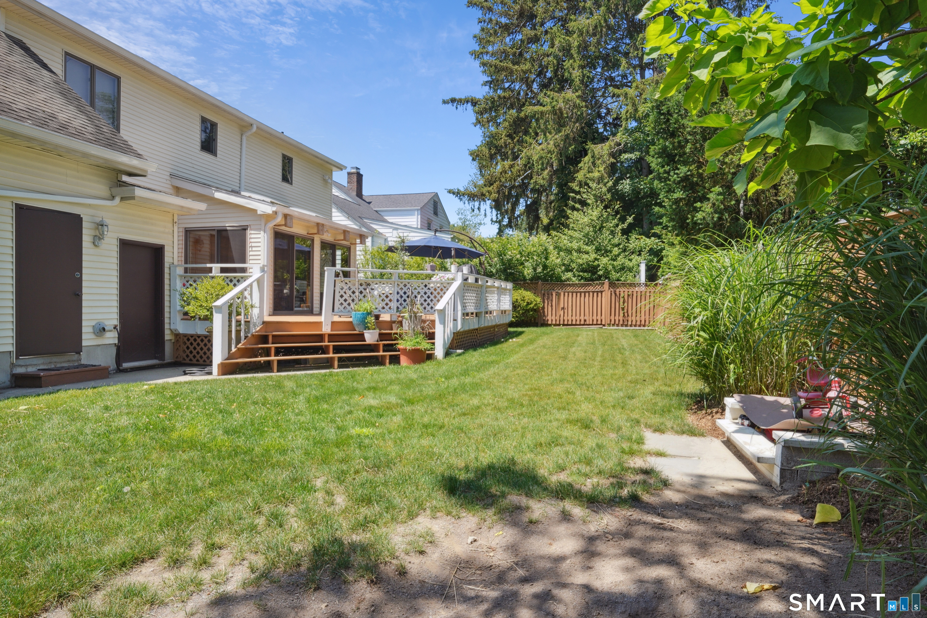 20 Norman Road Stamford, CT 06906 - Photo 25 of 35 a view of a house with backyard porch and sitting area