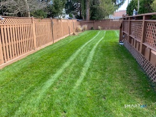 20 Norman Road Stamford, CT 06906 - Photo 26 of 35 a view of garden with wooden fence